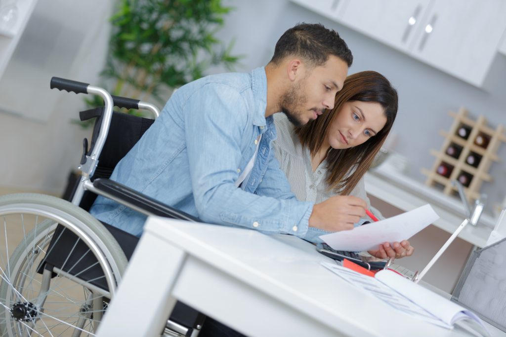photo of man and woman reviewing ERISA policy